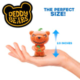Pumpkin-shaped teddy bear held in a hand with measurement label, 'DEDDY BEARS' brand visible.