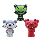 Three colorful toy figures on a white background