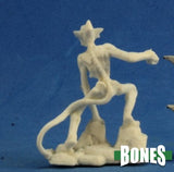 White plastic figurine of a skeleton on a blue background with 'BONES' branding.