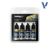 Vallejo True Metallic Metal Greenish Gold Paint Set in a clear blister pack containing four small bottles, shown on a white background with a blue Vallejo logo in the top right corner.