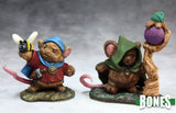 Two mouse figurines with fantasy elements on a gray background, featuring the brand 'BONES'.