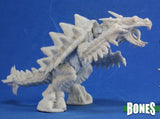 White dragon-like creature figurine on a blue background with 'BONES' branding.