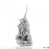 Gray figurine of a warrior with armor and helmet on a white background