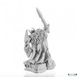 Gray figurine of a warrior with armor and a spear on a white background