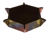 Hexagonal tray with snake skin pattern on a white background