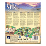 Board game box with a scenic landscape and game pieces on the back