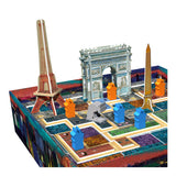 Model of a cityscape with iconic landmarks including the Eiffel Tower and Arc de Triomphe on a white background.