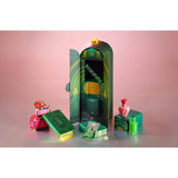 Green and pink perfume set with a door-like structure on a pink background