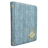 Blue textured notebook with gold emblem on a white background