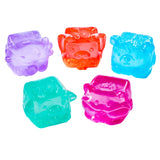 Five colorful ice cube-shaped toys on a white background