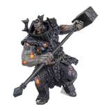 Fantasy figurine of a warrior in dark armor holding a large hammer on a white background