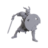 Unpainted warrior figurine with a sword and shield on a white background