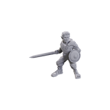 Gray warrior figurine with a sword and shield on a white background