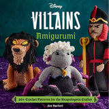 Book cover for Disney Villains Amigurumi by Lee Sartori, showing three crocheted character figures on a purple textured surface against a dark teal background. The figures include a lion, a gray character with white hair, and a black-and-red crowned figure holding a gold scepter.