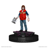 Figure of a character in a red vest holding a bag on a white background