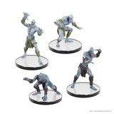 Four fantasy figurines on reflective stands against a white background