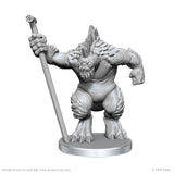 Unpainted fantasy monster figurine with a spear on a white background