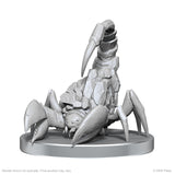 Unpainted scorpion figurine on a white background