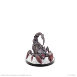 Scorpion figurine on a white background