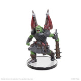 Goblin warrior figurine with armor and weapons on a white background