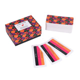 Card game set with colorful packaging and cards on a white background