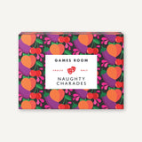 The product packaging for the 'Games Room: Naughty Charades' card game, featuring a colorful pattern of peaches, purple eggplants, and cherries on a dark background, with a white label in the center.