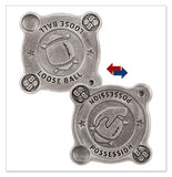 Two metallic badges with football and fish symbols and text on a white background