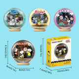 Snoopy-themed decorative balls with packaging and measurements on a blue background