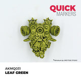 Decorative green mask with intricate designs on a white background, featuring the brand 'Quick Markers'.