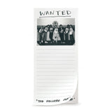Notepad with a photo of a group of people and text 'WANTED' on a white background