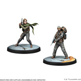 Two miniature figures on round bases with a plain background