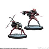 Two miniature figures in red and black armor with spears on a white background, featuring Lucasfilm Ltd. branding.