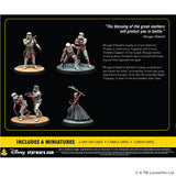 Star Wars miniatures set with figures and cards on a black background