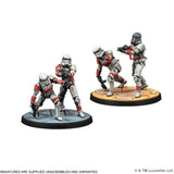 Three stormtrooper figurines in action poses on a white background with Lucasfilm Ltd. branding.