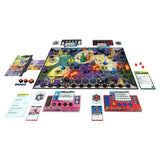 A board game set arranged on a white background, featuring a large rectangular game board with colorful illustrated terrain and characters, multiple rule cards, action tiles, dice, and accessory sheets.