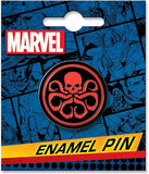 Marvel enamel pin with red and black design on a blue comic book background