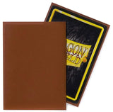 Brown card sleeves with a visible Dragon Shield logo on a white background
