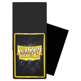Dragon Shield card sleeves with gold and yellow logo on a black background