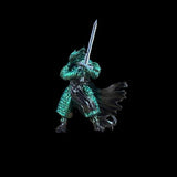 Frog figurine holding a sword on a black background