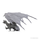 Gray dragon figurine with outstretched wings on a white background