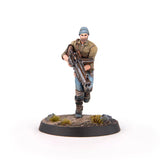 Miniature figure holding a weapon on a white background