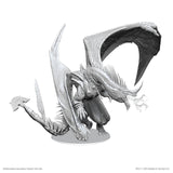 Gray dragon figurine on a white background