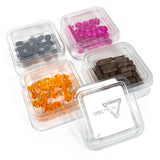 Clear containers with colorful beads and chocolate pieces, branded 'Spectra'.