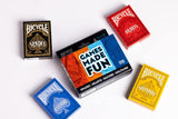 Five Bicycle playing card boxes in different colors on a white background