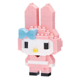 Pink rabbit-shaped building block toy with a blue bow on a white background