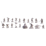 Set of white unpainted miniature figures on a white background