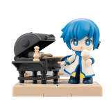 Figurine of a character with blue hair next to a small black piano on a beige base.
