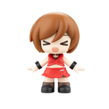 Toy figure with brown hair and red outfit on a white background