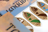 Wooden boat-shaped game components