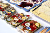 Colorful game cards with various designs on a white surface